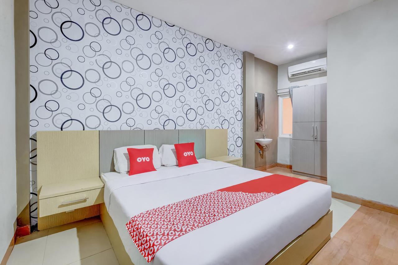Oyo Flagship 3726 Tembok Batu Residence Tugu Екстериор снимка