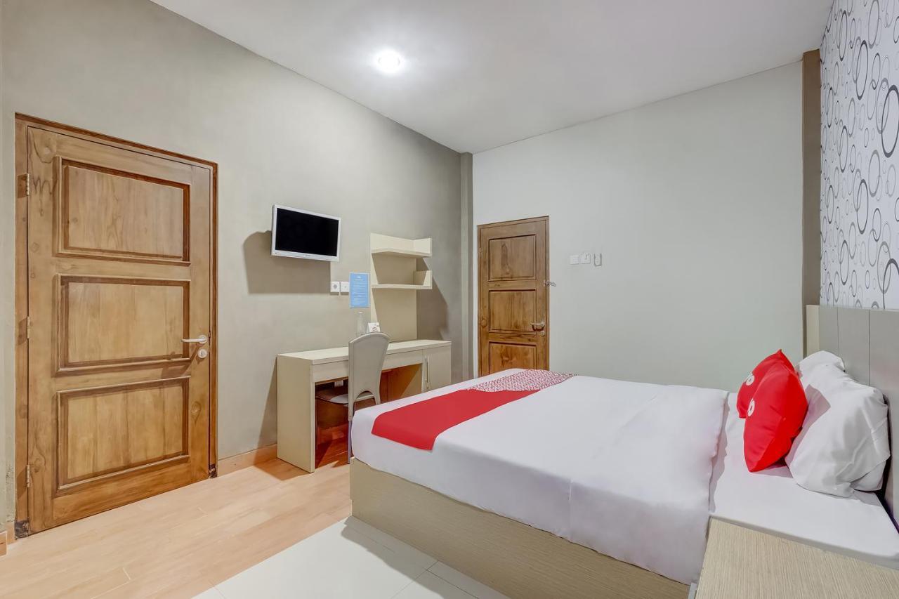 Oyo Flagship 3726 Tembok Batu Residence Tugu Екстериор снимка